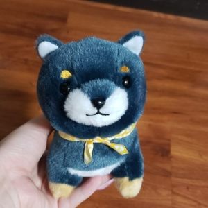 Small plushie of a shiba